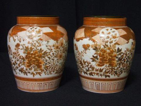 Appraisal: PAIR JAPANESE KUTANI OVOID JARS Late th century delicately painted