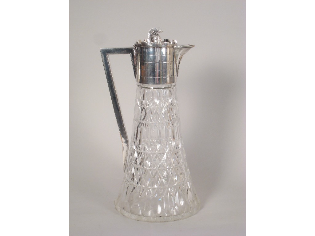 Appraisal: An Edwardian cut-glass Claret Jug with EP mount in the