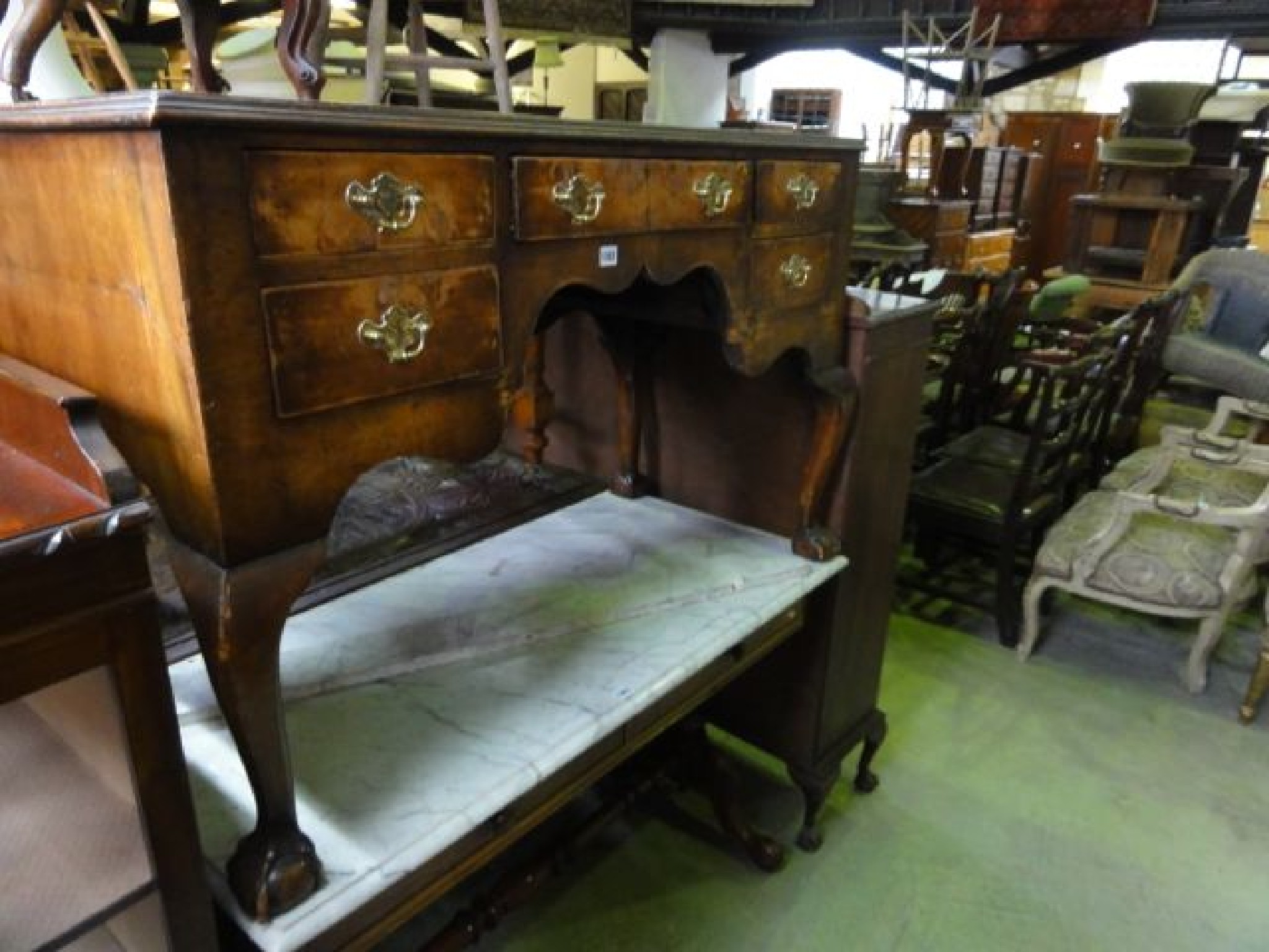 Appraisal: A th century walnut veneered kneehole side dressing table in