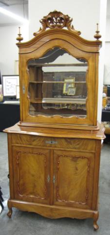 Appraisal: Antique two-piece bookcase mahogany crotch-cut veneer and flame mahogany scroll