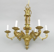 Appraisal: Brass Chandelier A traditional style carved and cast brass chandelier