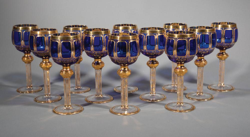 Appraisal: Twelve Gilt-Decorated Cobalt and Clear Crystal Wine Goblets probably Moser