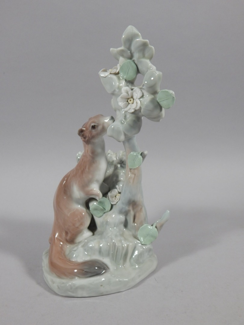 Appraisal: A Lladro figure group of an animal eating leaves cm