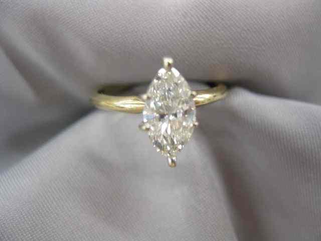 Appraisal: Diamond Solitaire Ring carat marquis diamond color-H clarity in k