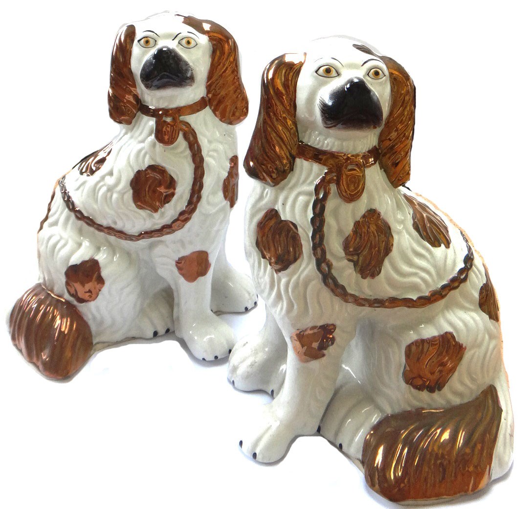 Appraisal: A pair of Staffordshire flatback spaniels late th century front