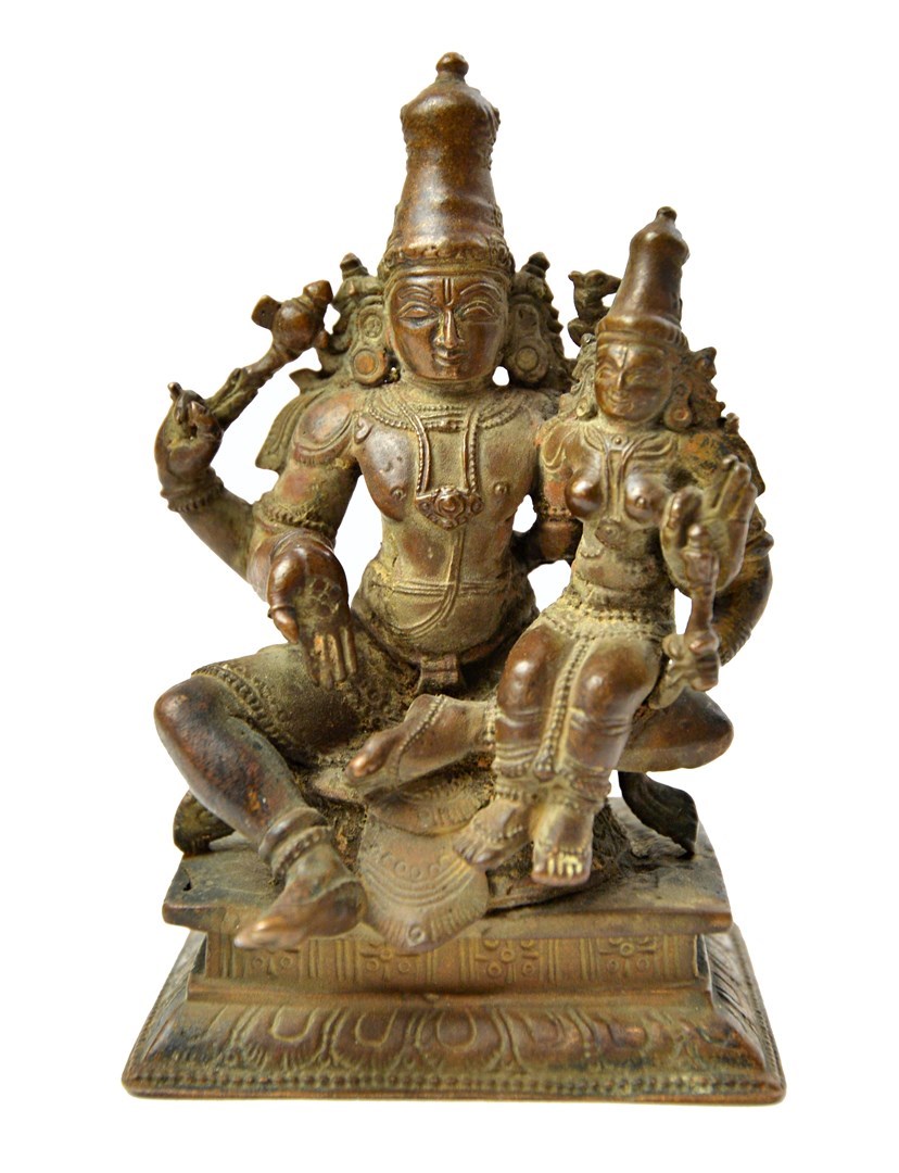 Appraisal: A bronze group of Shiva and Parvati South India th