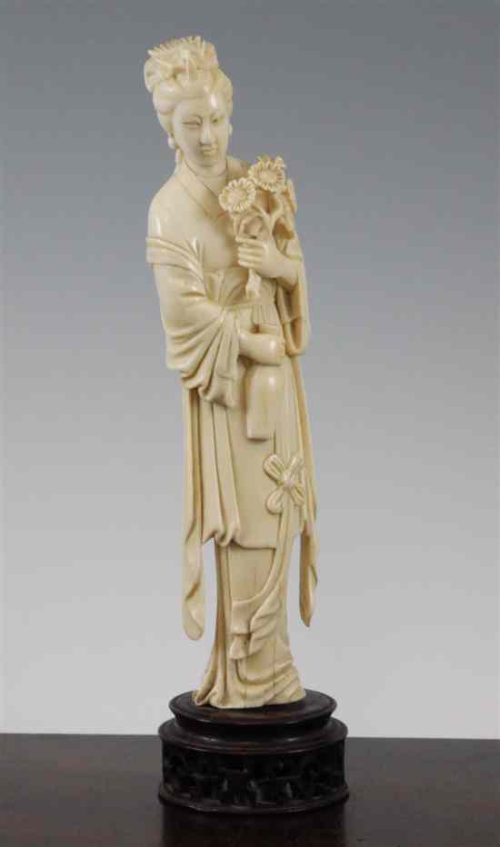 Appraisal: A large Chinese ivory figure of a female immortal early