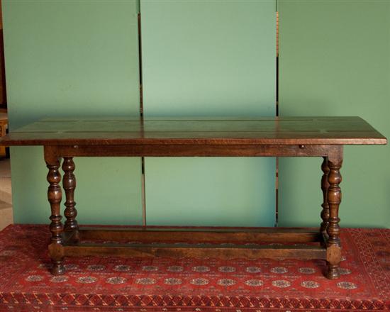 Appraisal: An Unusual English Oak Console Sofa Table having a top