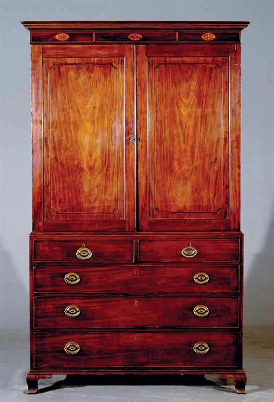 Appraisal: George III inlaid mahogany linen press circa molded top over