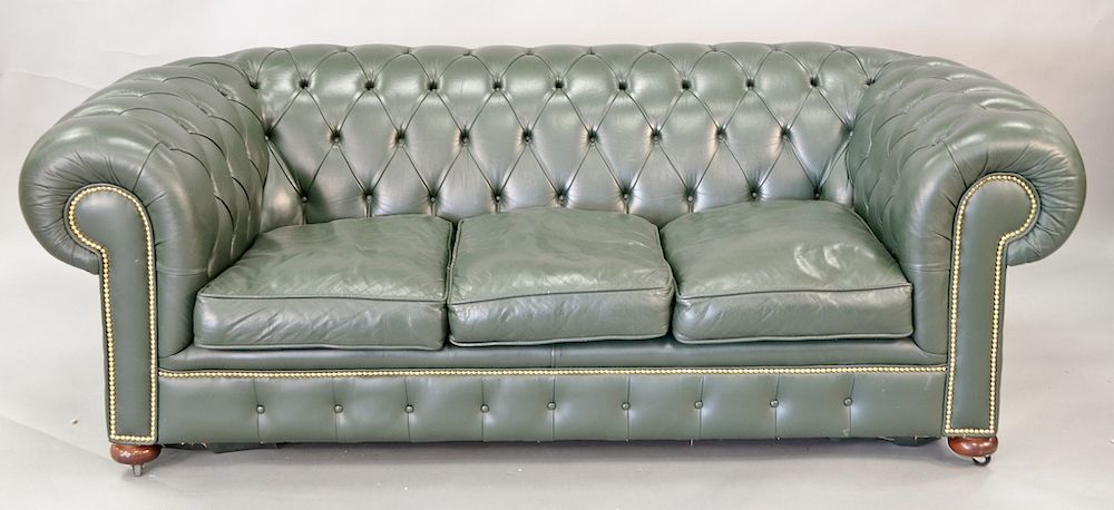 Appraisal: Chesterfields of London green leather Chesterfield sofa ht in wd