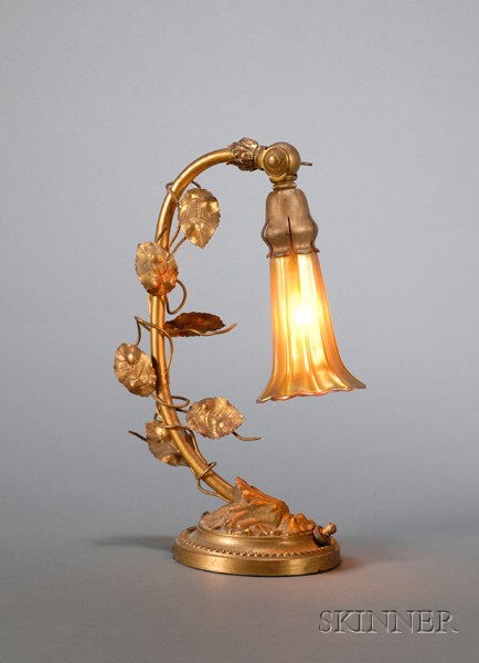 Appraisal: Quezal Boudoir Lamp Iridescent glass and gilded metal th century