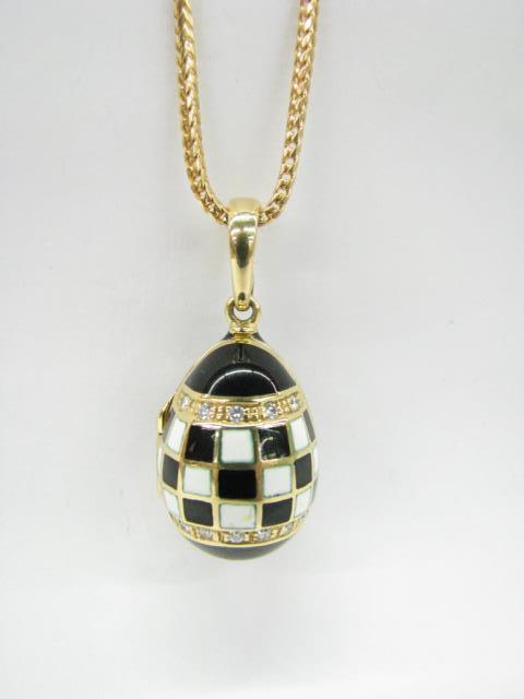 Appraisal: An K yellow gold limited edition o Faberge egg pendant