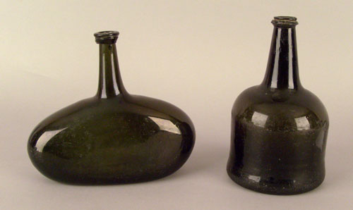 Appraisal: Green glass squat bottle th c h together with another