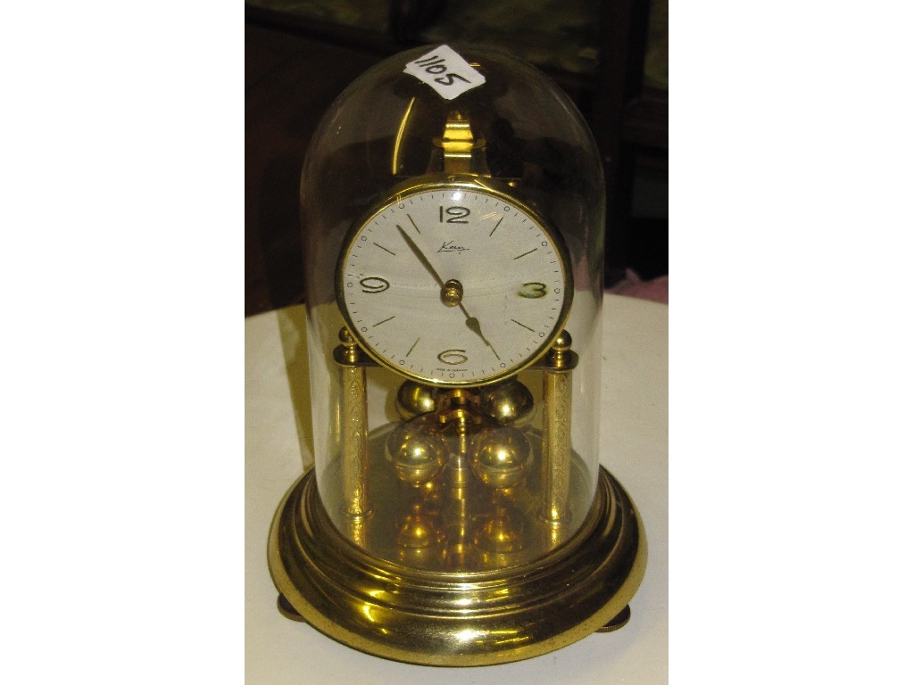 Appraisal: Mantel clock in glass dome cover