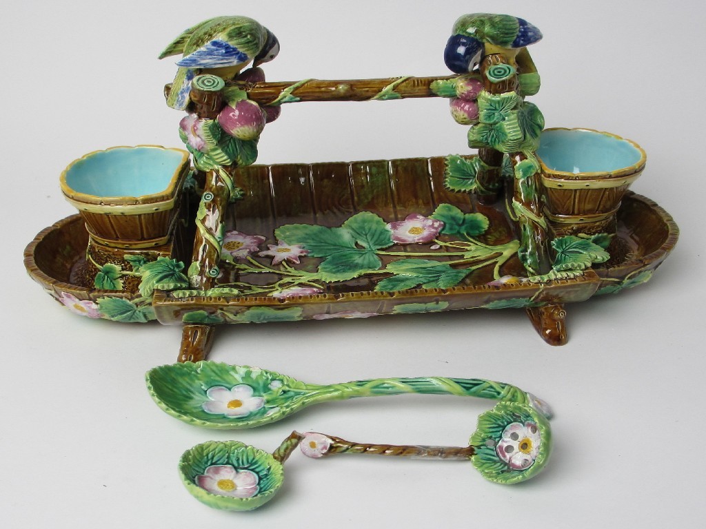 Appraisal: A George Jones majolica strawberry dish the cross frame above