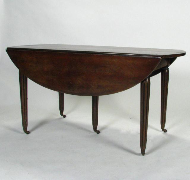 Appraisal: Period Style Large Drop Leaf Dining Table with fluted tapered