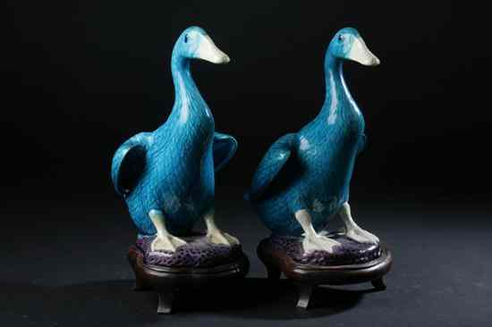 Appraisal: CHINESE TURQUOISE AND AUBERGINE PORCELAIN FIGURES OF DUCKS Marked ''Made