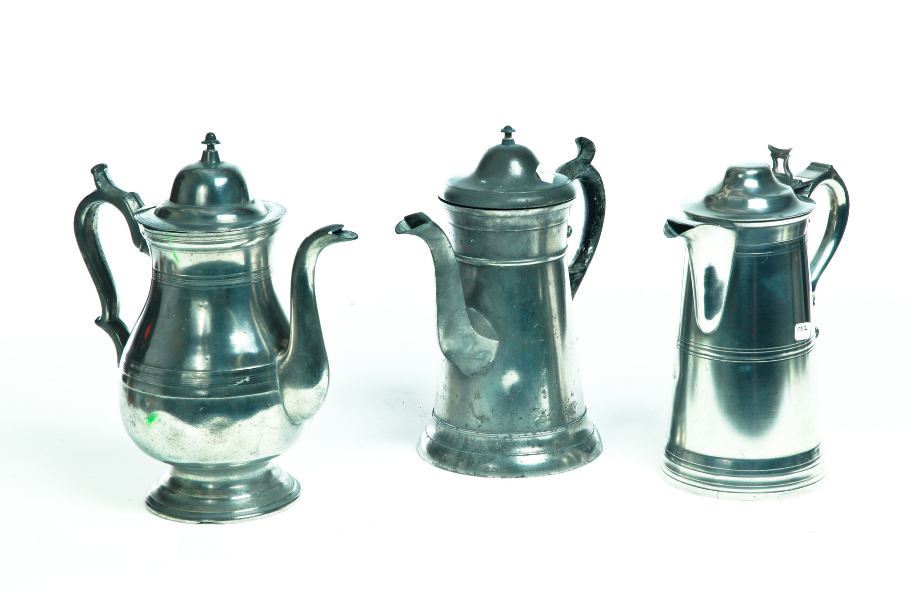 Appraisal: TWO AMERICAN PEWTER TALL POTS AND A FLAGON Early th