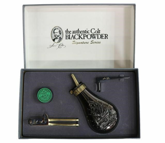 Appraisal: Colt Blackpowder accessory kit including powder flask bullet mold cap