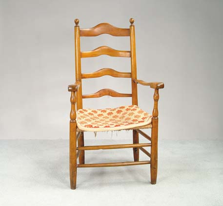 Appraisal: TH CENTURY LADDERBACK ARM CHAIR Four graduated shaped horizontal ladderbacks