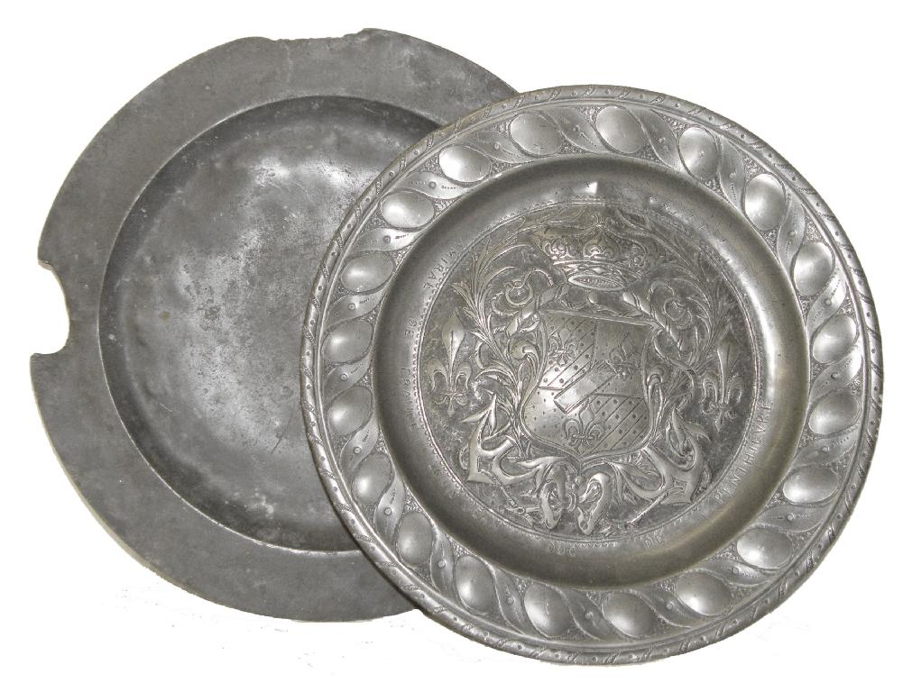 Appraisal: th century Continental pewter armorial repousse and wriggle work charger