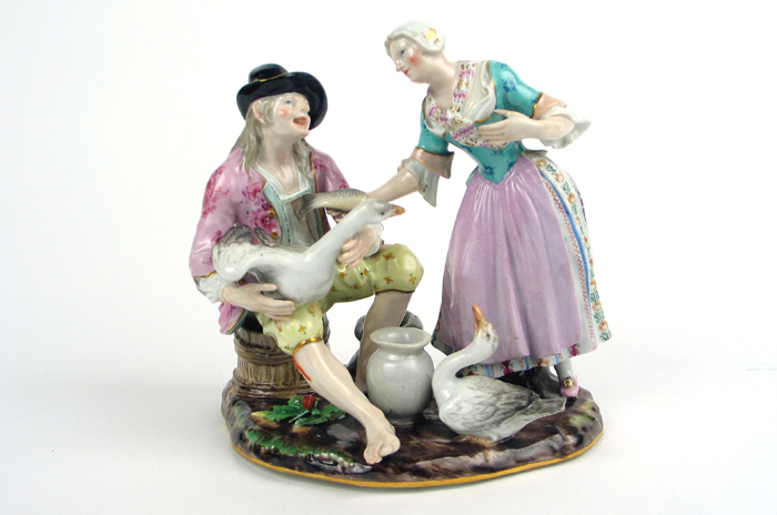 Appraisal: MEISSEN PORCELAIN FIGURAL GROUP th century Woman standing offering half