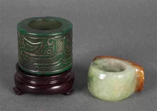 Appraisal: Two Chinese carved jade scholar's thumb rings dark green with