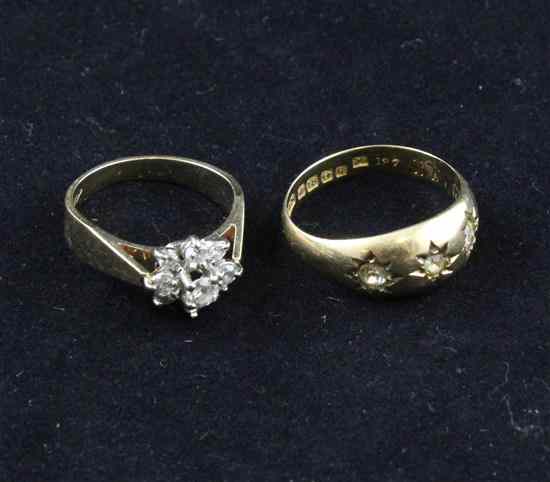 Appraisal: A ct gold diamond cluster ring and a gypsy set