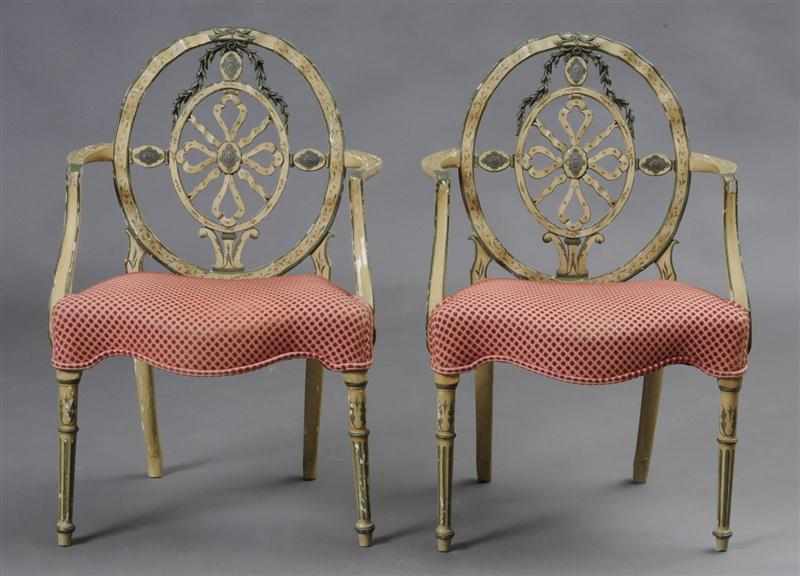 Appraisal: PAIR OF GEORGE III STYLE PAINTED WHEEL-BACK ARMCHAIRS Each oval