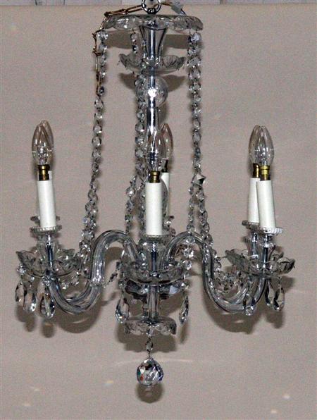 Appraisal: A six branch crystal chandelier the baluster form column with