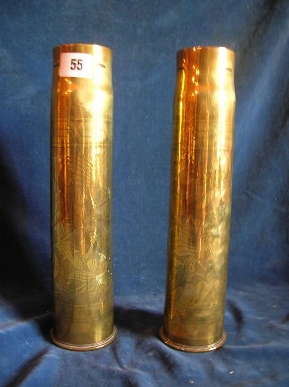 Appraisal: A pair of British lb cartridge cases dated decorated with