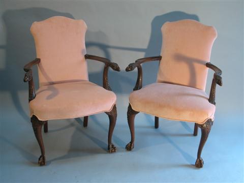 Appraisal: PAIR OF ENGLISH EAGLE ARMCHAIRS Circa 's each with padded