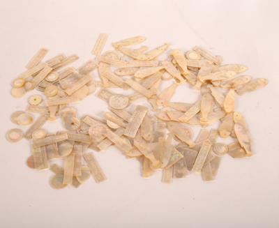 Appraisal: A quantity of Cantonese mother-of-pearl gaming tokens including fish shaped