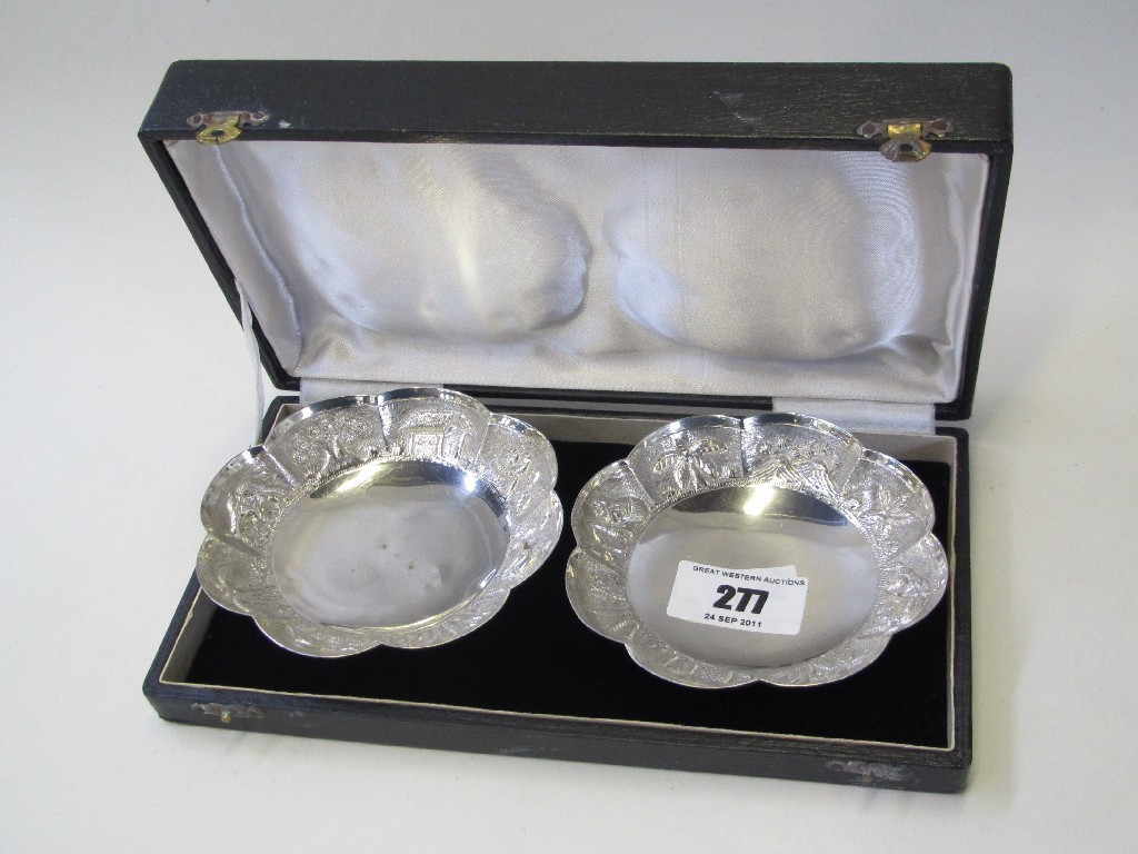 Appraisal: Lot comprising cased pair of Eastern white metal dishes and