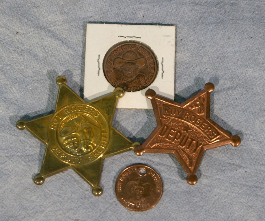 Appraisal: Roy Rogers metal items including Roy Rogers Deputy Sheriff star