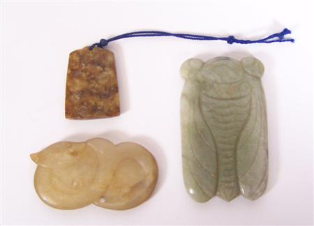 Appraisal: A Chinese pale brown jade amulet Qing Dynasty in the