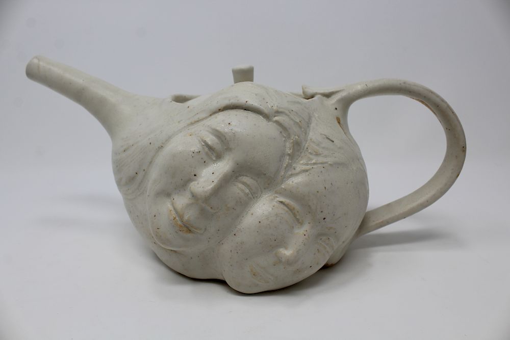 Appraisal: Hand Crafted Inuit Face Teapot Signed on base Hand made