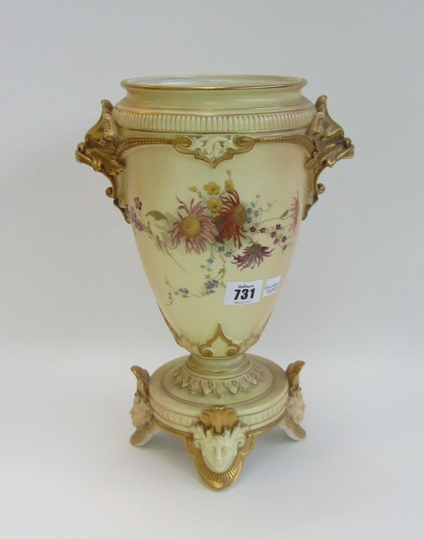 Appraisal: A Royal Worcester blush ivory lamp base c with two