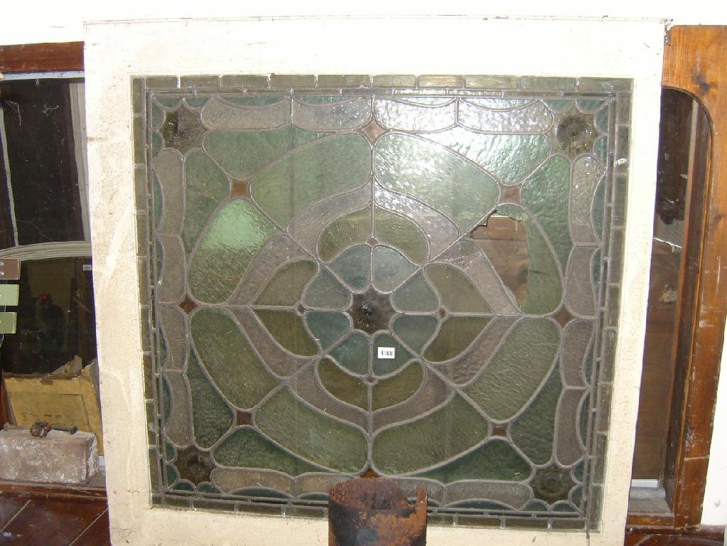 Appraisal: A late Victorian coloured leaded light panel of square cut