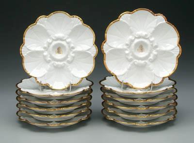 Appraisal: Set of French oyster plates porcelain with scalloped gilt borders