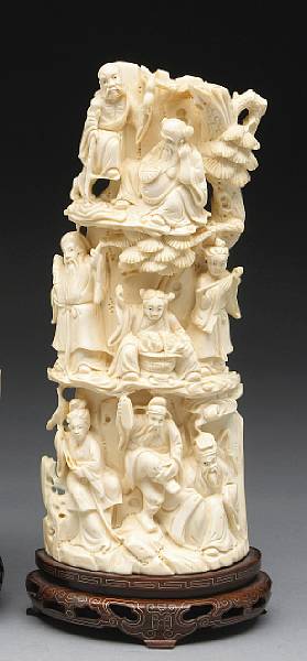 Appraisal: An ivory carving of immortals The large section of tusk