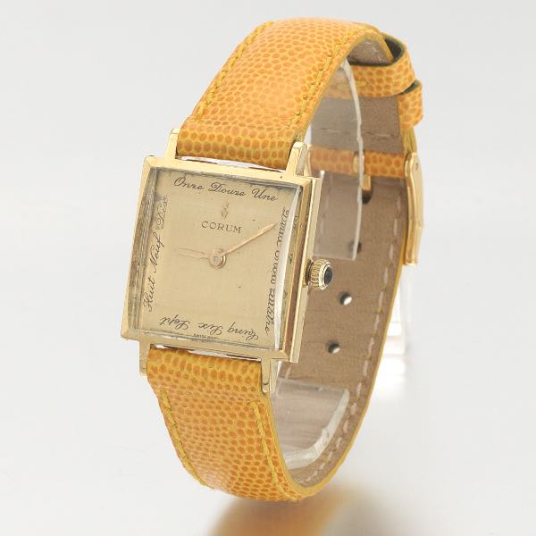 Appraisal: CORUM K GOLD SWISS MADE DRESS WATCH WITH GUCCI MADE