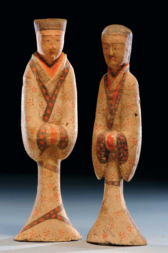 Appraisal: PAIR HAN POTTERY FIGURES Pair of tall Chinese Han Dynasty