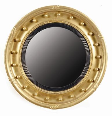 Appraisal: An early th century giltwood and gesso convex wall mirror