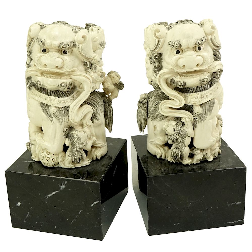 Appraisal: Pair of Chinese Carved Ivory Foo Dogs Figures Pair of