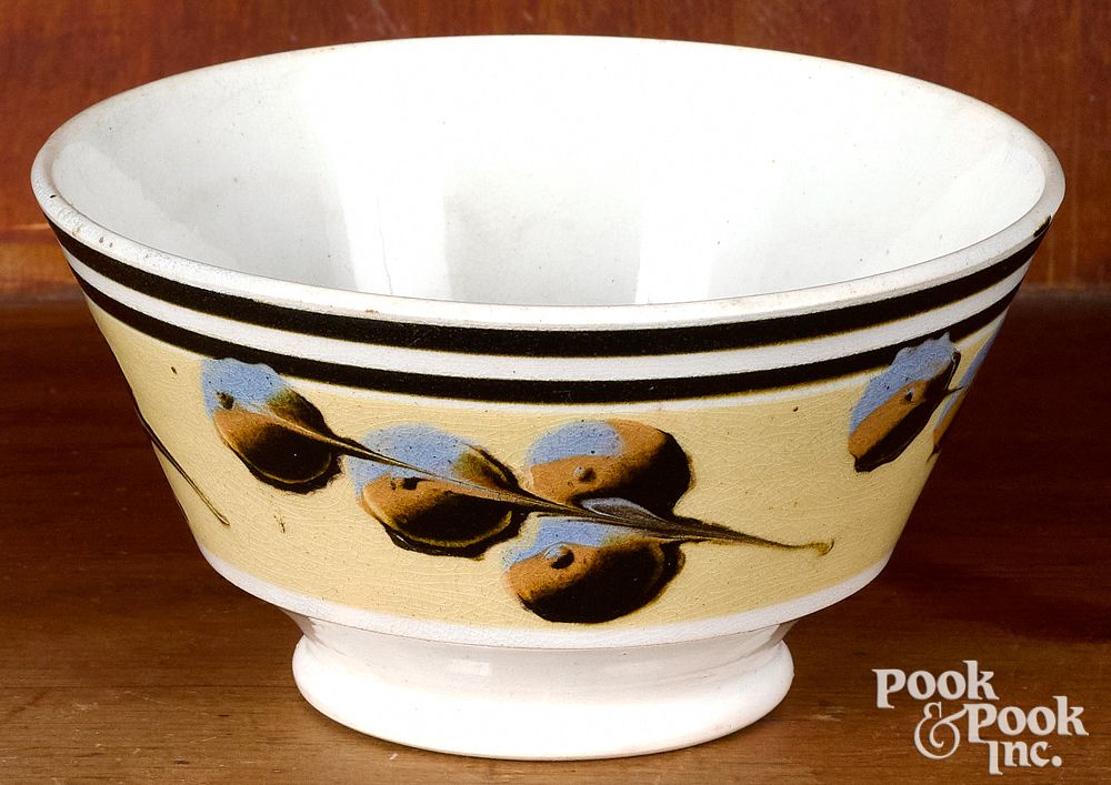 Appraisal: Mocha bowl with cat's-eye decoration Mocha bowl with cat's-eye decoration