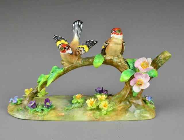 Appraisal: BONE CHINA DOUBLE FINCH ON BRANCH FIGURINEVery nice J T