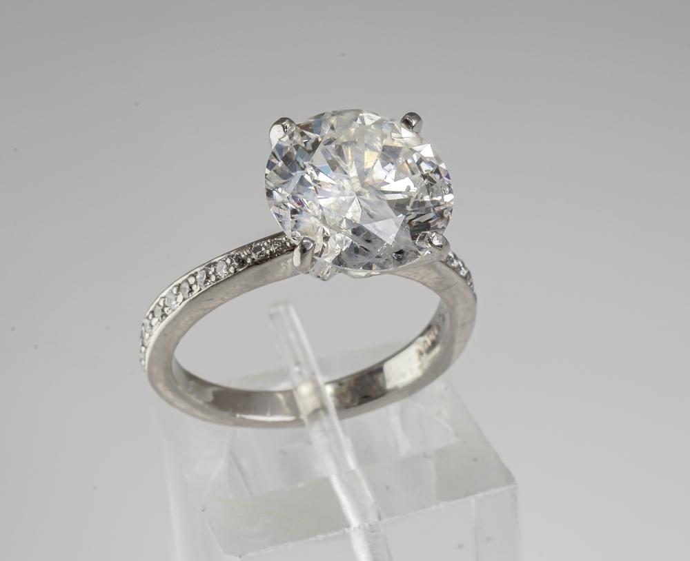 Appraisal: PLATINUM AND LASER-DRILLED DIAMOND RINGPlatinum and Laser-Drilled Diamond Ring The