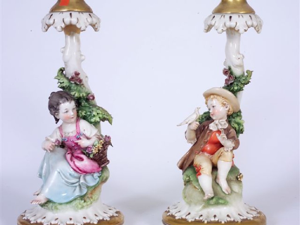 Appraisal: PAIR OF CONTINENTAL PORCELAIN FIGURAL CANDLESTICKS LATE th EARLY th