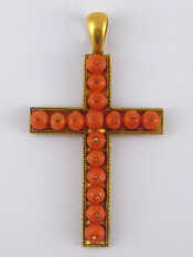 Appraisal: A th century carat gold and coral cross pendant the